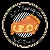 Circular logo featuring a stylized slice of cheesecake with caramel drizzle, set against a black and white diagonal striped background, encircled by a gold border with the text 'La Cheesegería' arched at the top and 'By El Caserito' curved at the bottom in elegant script font.